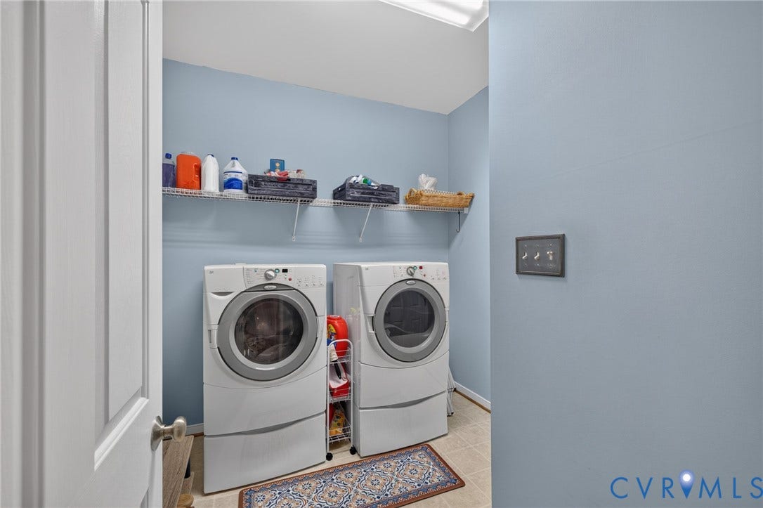937 Gorham Court, Midlothian, VA 23114 Spacious Laundry area with tile flooring and wire shelving. Located on first floor adjacent to garage.