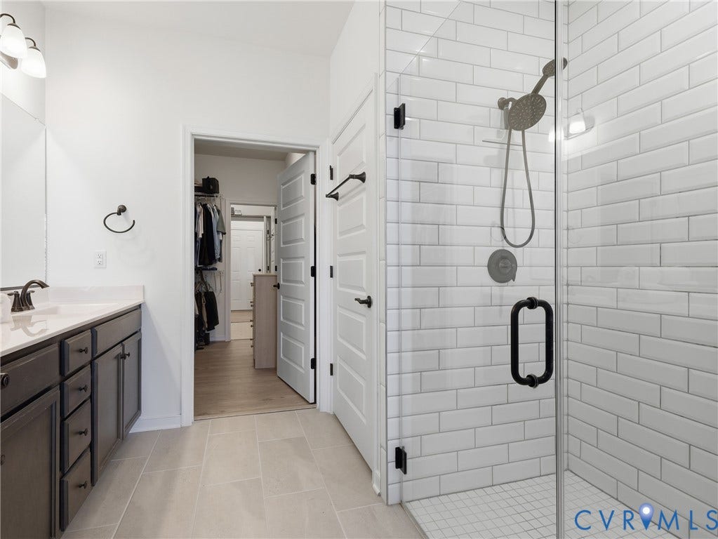 9220 Cerulean Place, Mosaic At West Creek, Goochland, VA 23238 Walk-in shower with subway tile surround and glass enclosure