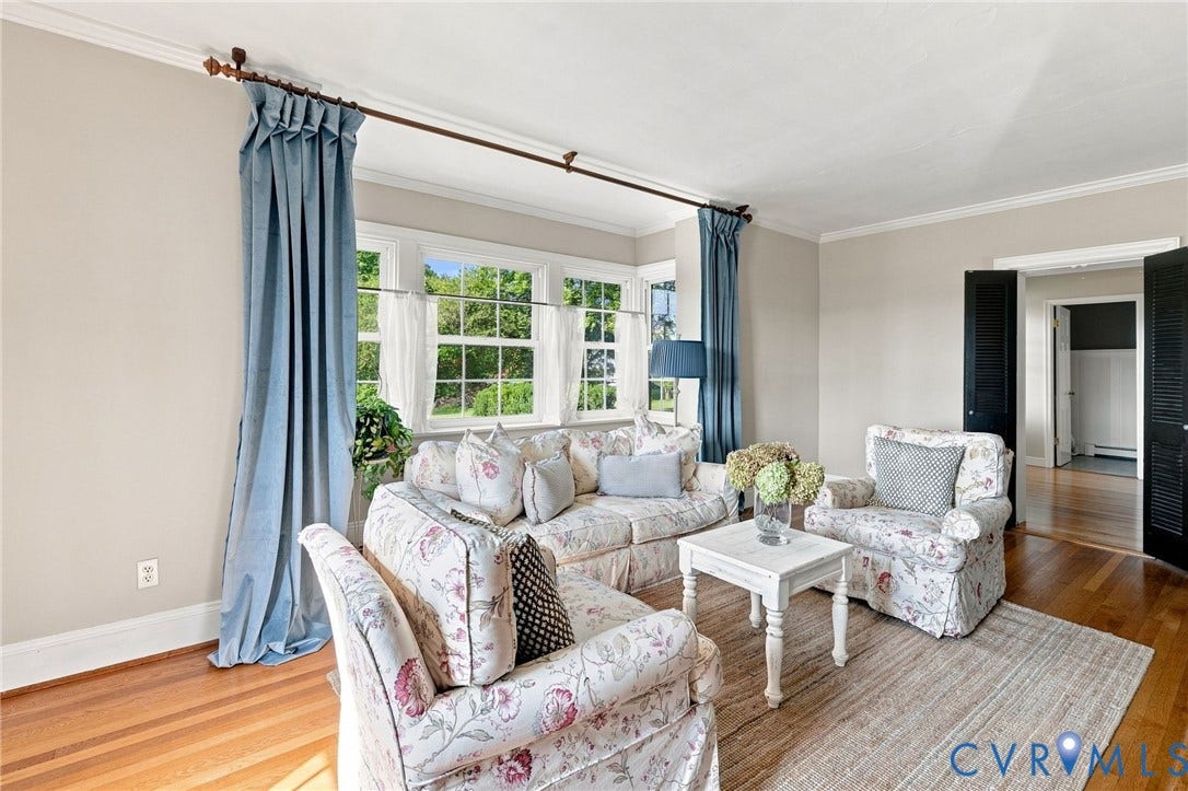 7134 Messer Road, Henrico, VA 23231 Hardwood flooring, crown molding, multiple windows, and louvered double doors