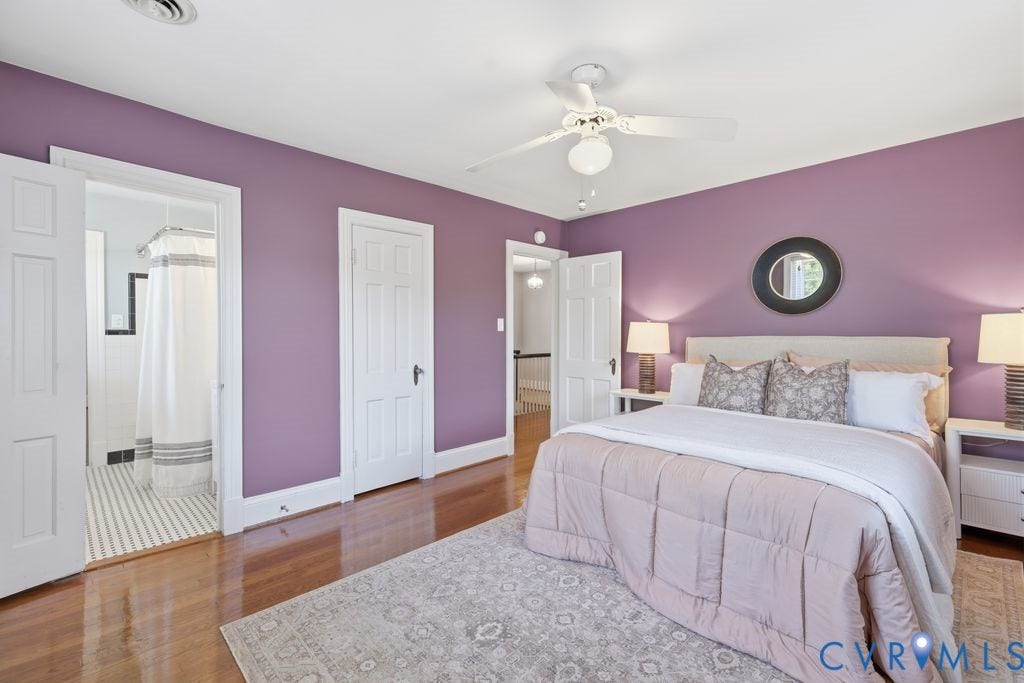 4117 W Franklin Street, Malvern Gardens, Richmond, VA 23221 Hardwood flooring, ceiling fan, white trim, and direct bathroom access with striped tile flooring