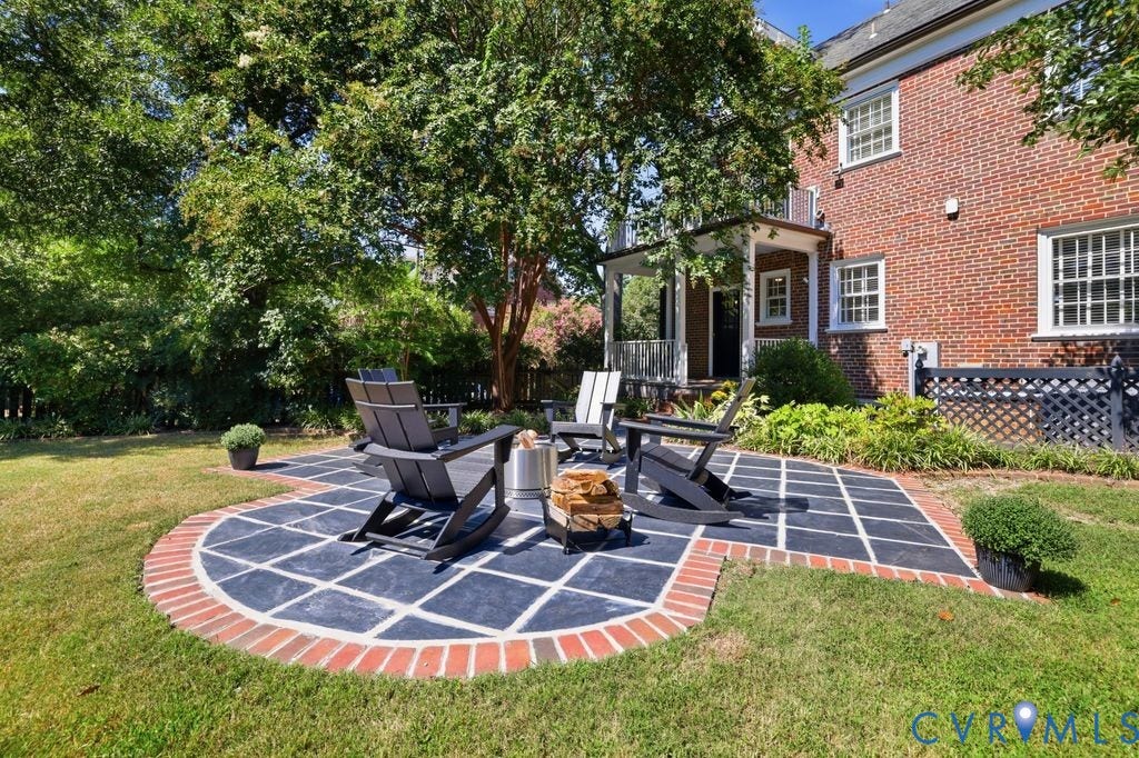 4117 W Franklin Street, Malvern Gardens, Richmond, VA 23221 Backyard patio featuring dark-toned pavers and a brick border