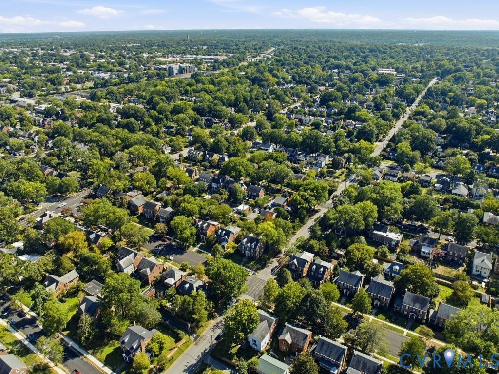 4117 W Franklin Street, Malvern Gardens, Richmond, VA 23221 Aerial perspective of a verdant neighborhood with residential properties, mature trees, and roadways