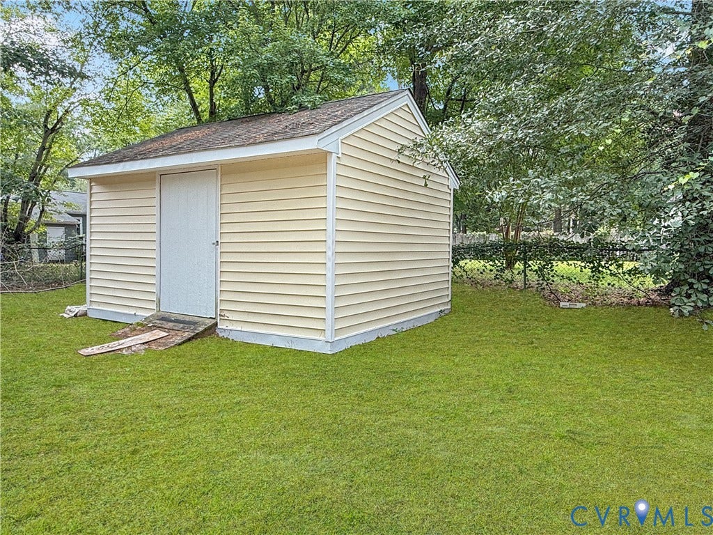 3203 Roland View Terrace, Chester, VA 23831 Detached storage shed with horizontal siding and a single entry door