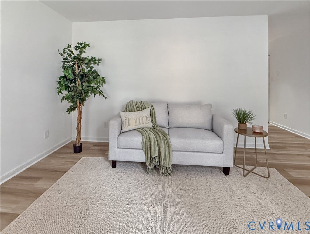 3203 Roland View Terrace, Chester, VA 23831 Light-toned wood-finish flooring complements crisp white walls