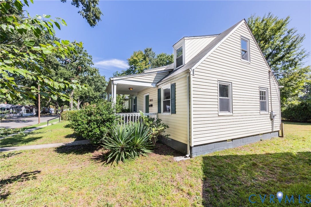 3505 Meadowbridge Road, Richmond, VA 23222 Siding exterior with dormer window, covered front porch, and mature landscaping