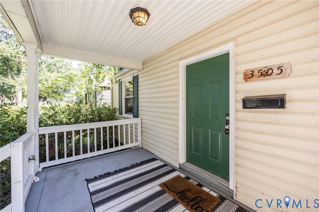 3505 Meadowbridge Road, Richmond, VA 23222 Welcoming front porch featuring a white-railed deck, slate-colored composite decking, and a striped entry mat