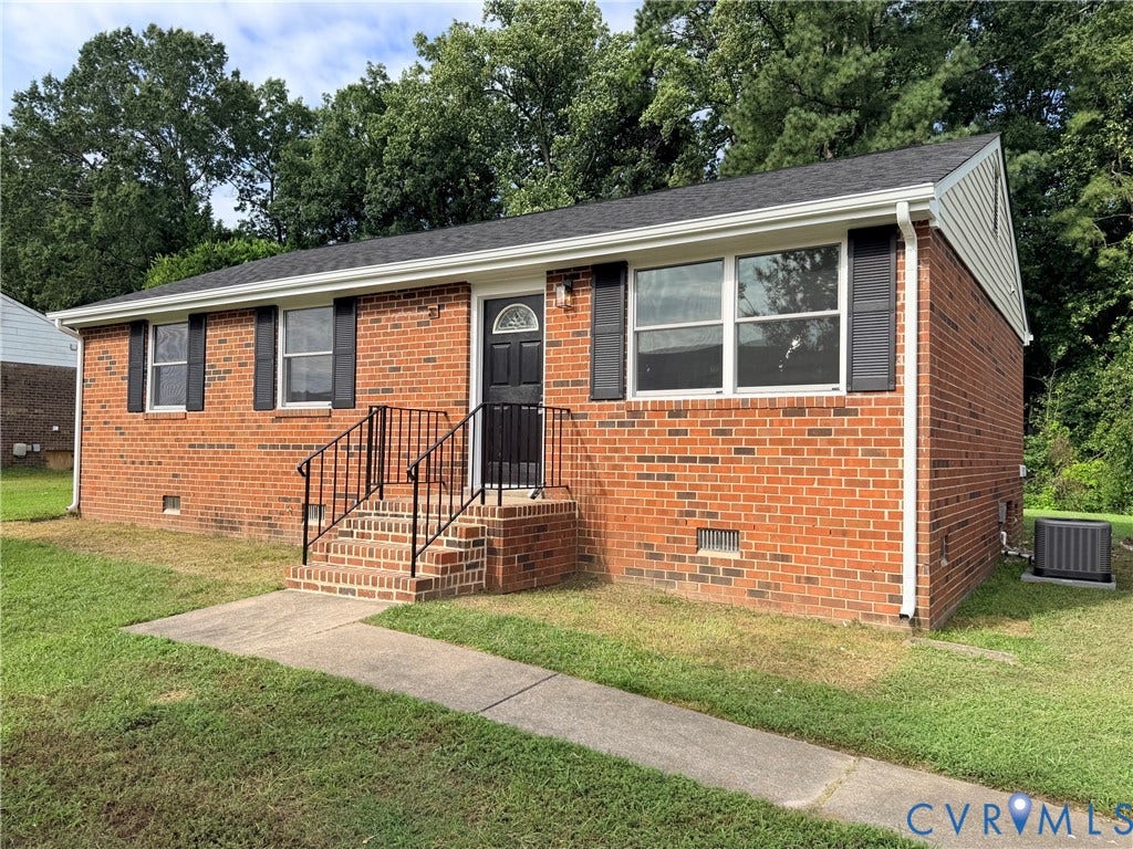 3924 Lamplighter Drive, Richmond, VA 23234 Brick exterior with a dark shingle roof and white gutters