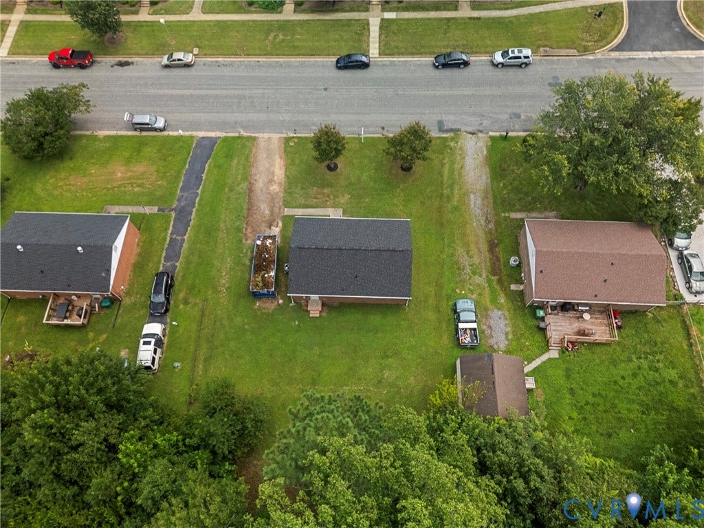 3924 Lamplighter Drive, Richmond, VA 23234 Aerial perspective of a property featuring a central structure with a dark shingle roof
