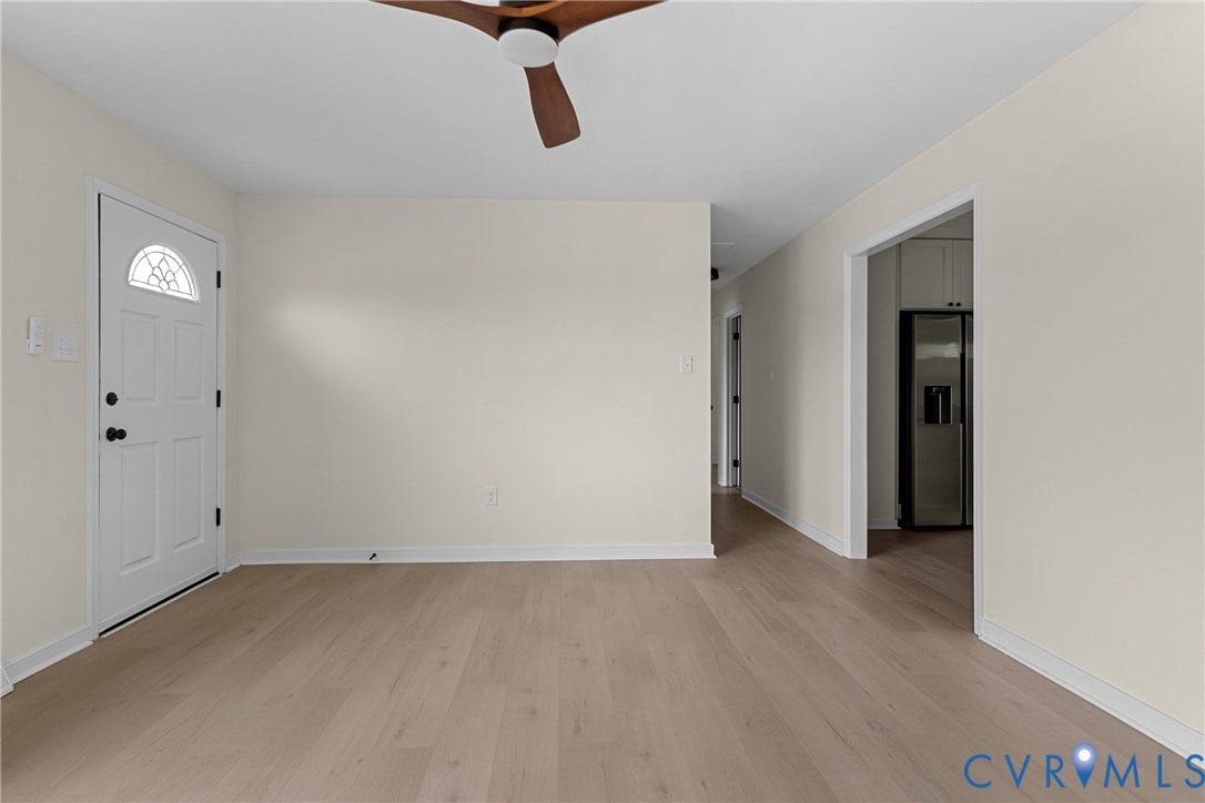 3924 Lamplighter Drive, Richmond, VA 23234 Light wood-finish flooring complements the neutral wall tones