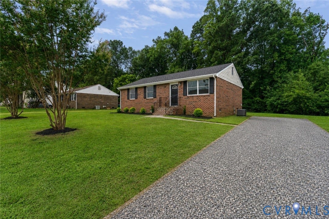 3924 Lamplighter Drive, Richmond, VA 23234 Brick exterior with black shutters and a black front door