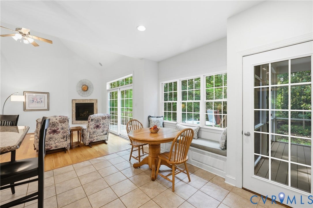 2431 Magnolia Ridge, Michael L Parrish, Maidens, VA 23102 Sunlit breakfast area with built-in window bench and access to the screened-in porch
