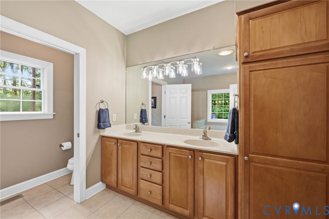 2431 Magnolia Ridge, Michael L Parrish, Maidens, VA 23102 Double vanities, built-in storage and separate water closet