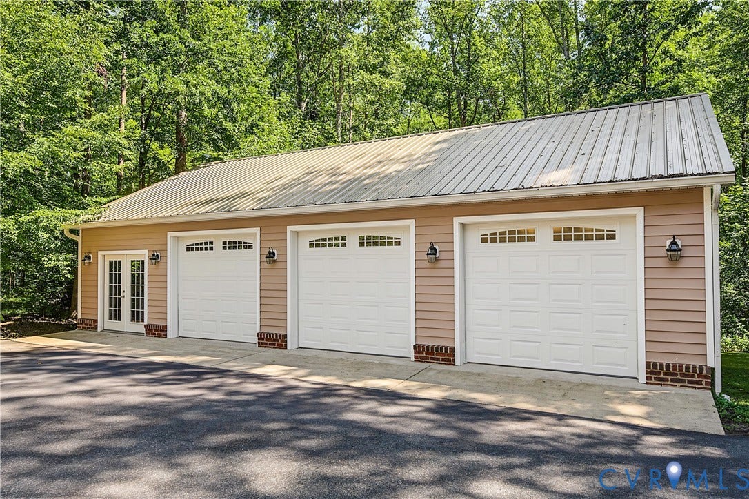 2431 Magnolia Ridge, Michael L Parrish, Maidens, VA 23102 Detached 3-car garage has a temperature controlled workshop inside ready for your next project