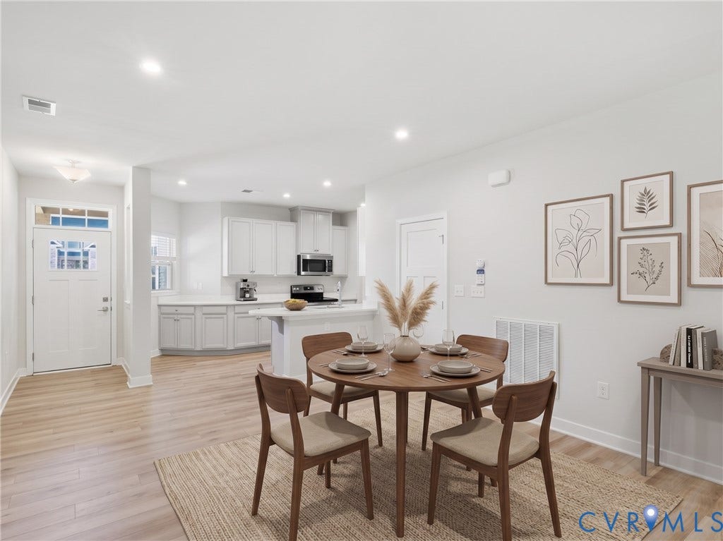 Flexible dining area connected to the home's spacious open-concept layout [Virtually staged for visualization purposes; actual room is unfurnished.]