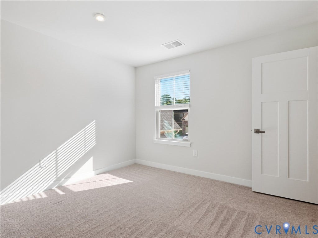 8060 Wistar Glen Drive, Henrico, VA 23228 Versatile third bedroom ready for guests, family, or a home office