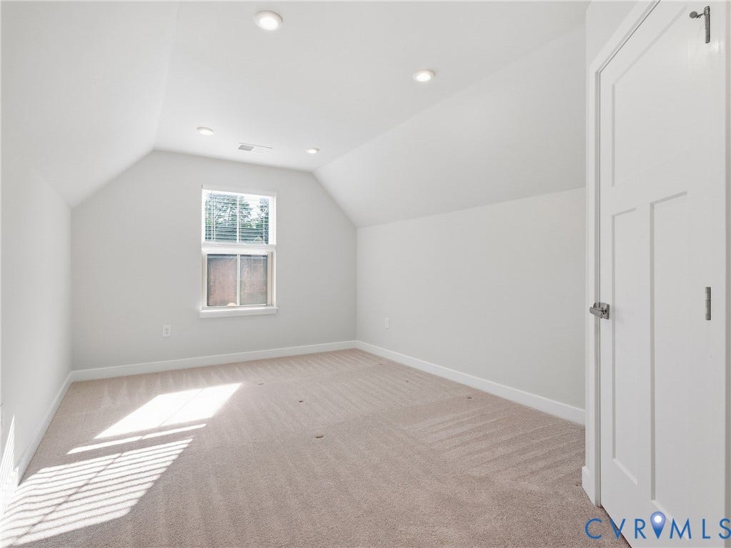 8060 Wistar Glen Drive, Henrico, VA 23228 Spacious second bedroom with sloped ceilings and plush carpeting