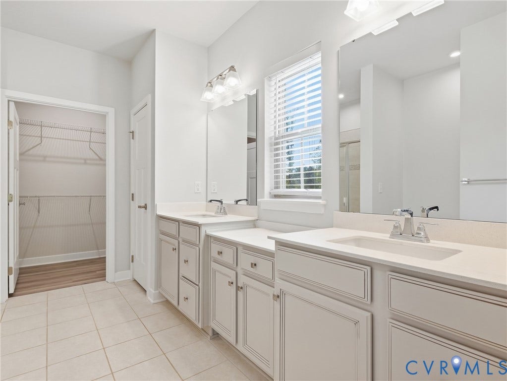 8060 Wistar Glen Drive, Henrico, VA 23228 Private ensuite bathroom with dual vanities, linen closet, and a walk-in closet