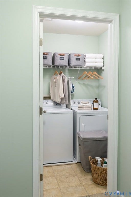 11617 Vicars Ridge Lane, Glen Allen, VA 23059 Dedicated laundry area with a washer and dryer, wire shelving, and a hanging rod