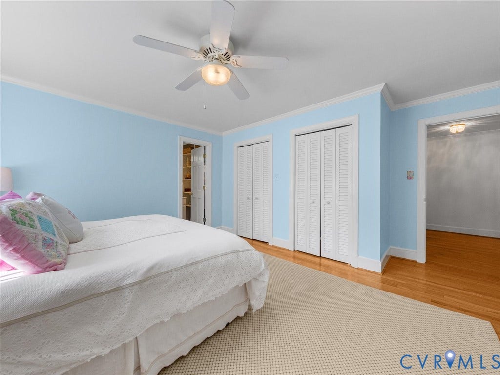 500 Kilmarnock Drive, Collegiate Area, Henrico, VA 23229 Hardwood flooring, painted walls, ceiling fan with integrated lighting, and louvered closet doors