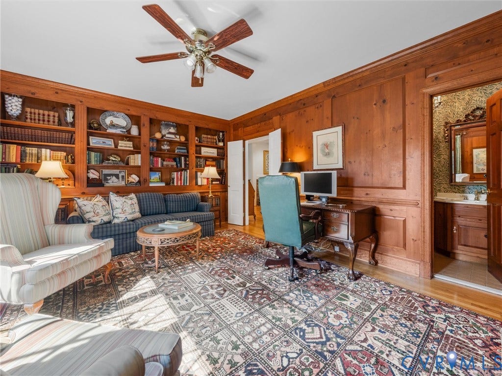 500 Kilmarnock Drive, Collegiate Area, Henrico, VA 23229 Wood paneling and built-in bookshelves define this space