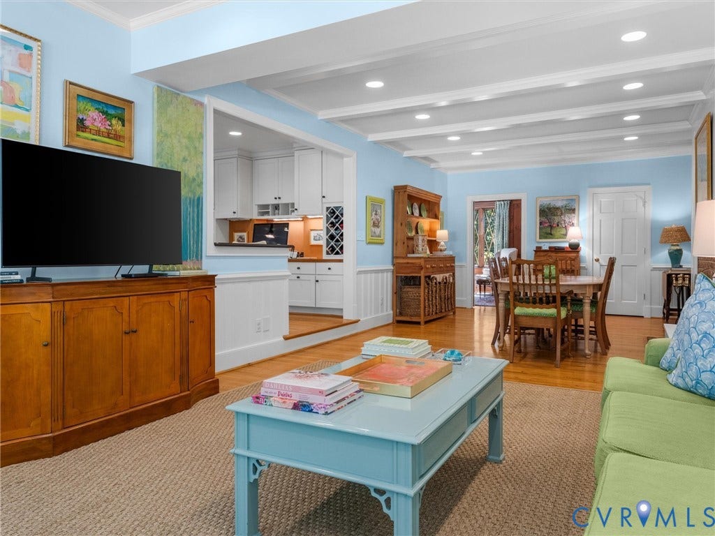 500 Kilmarnock Drive, Collegiate Area, Henrico, VA 23229 Hardwood flooring, coffered ceiling with recessed lighting, wainscoting, built-in wine rack, and white cabinetry