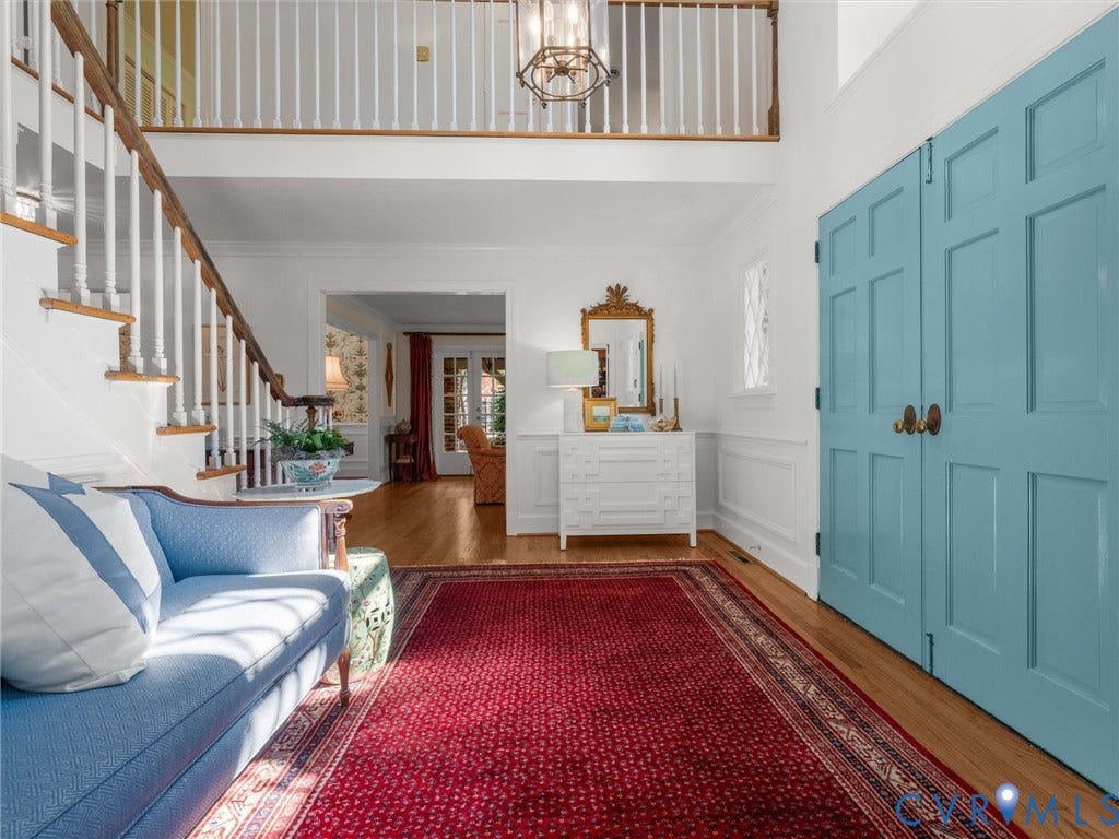 500 Kilmarnock Drive, Collegiate Area, Henrico, VA 23229 Two-story foyer with a staircase featuring wood treads and white balusters