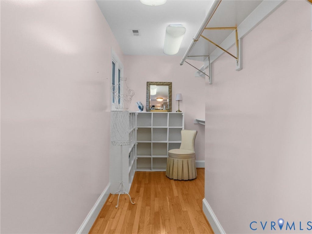 500 Kilmarnock Drive, Collegiate Area, Henrico, VA 23229 Hardwood-finish flooring, built-in shelving, and a window for natural light