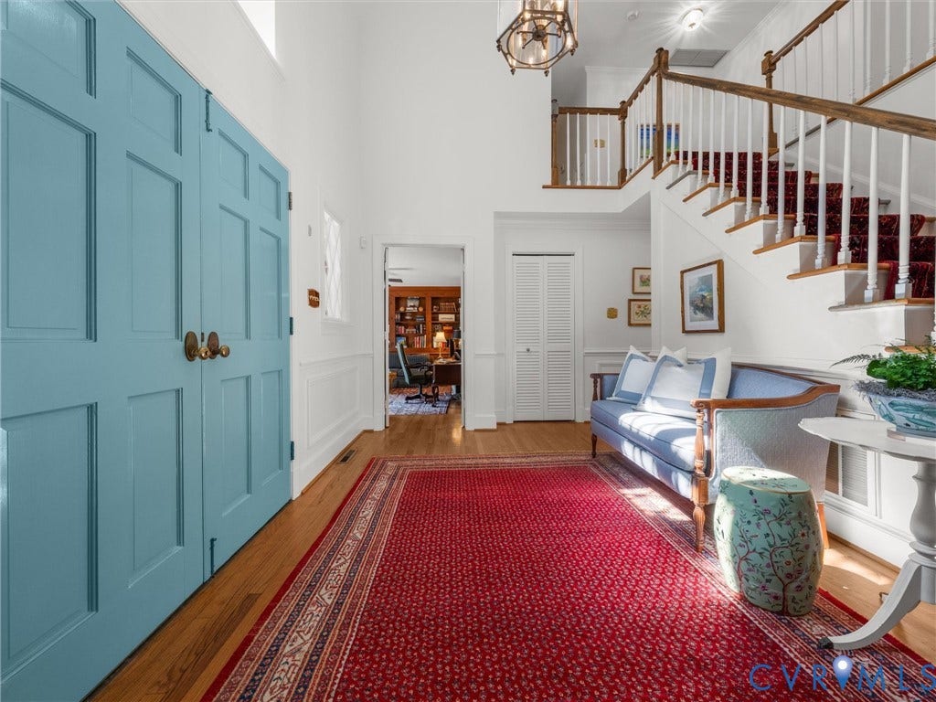 500 Kilmarnock Drive, Collegiate Area, Henrico, VA 23229 Two-story entry with wood-finish flooring, paneled doors, wainscoting, and a staircase with a wood handrail