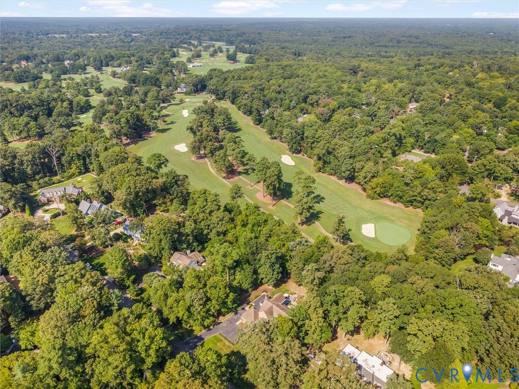 500 Kilmarnock Drive, Collegiate Area, Henrico, VA 23229 Aerial perspective showcasing surrounding mature trees and a golf course with greens and sand traps