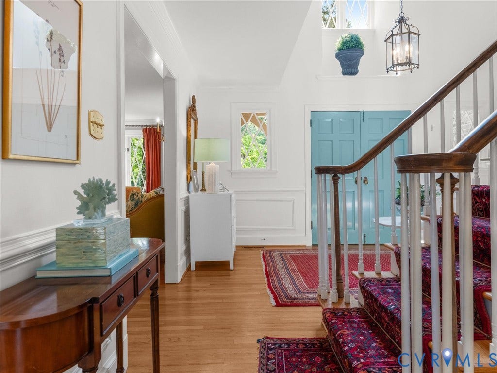 500 Kilmarnock Drive, Collegiate Area, Henrico, VA 23229 Hardwood flooring, painted blue double doors, white wainscoting, upper transom windows, and a staircase with wood handrail