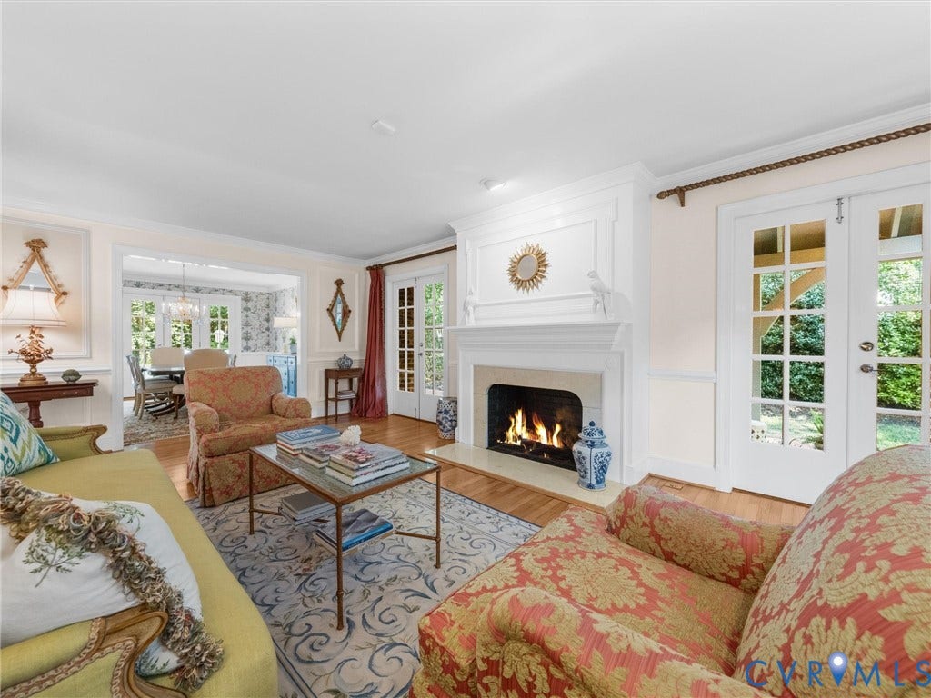 500 Kilmarnock Drive, Collegiate Area, Henrico, VA 23229 Hardwood flooring, an ornate fireplace with mantel and hearth, and double French doors with transom windows