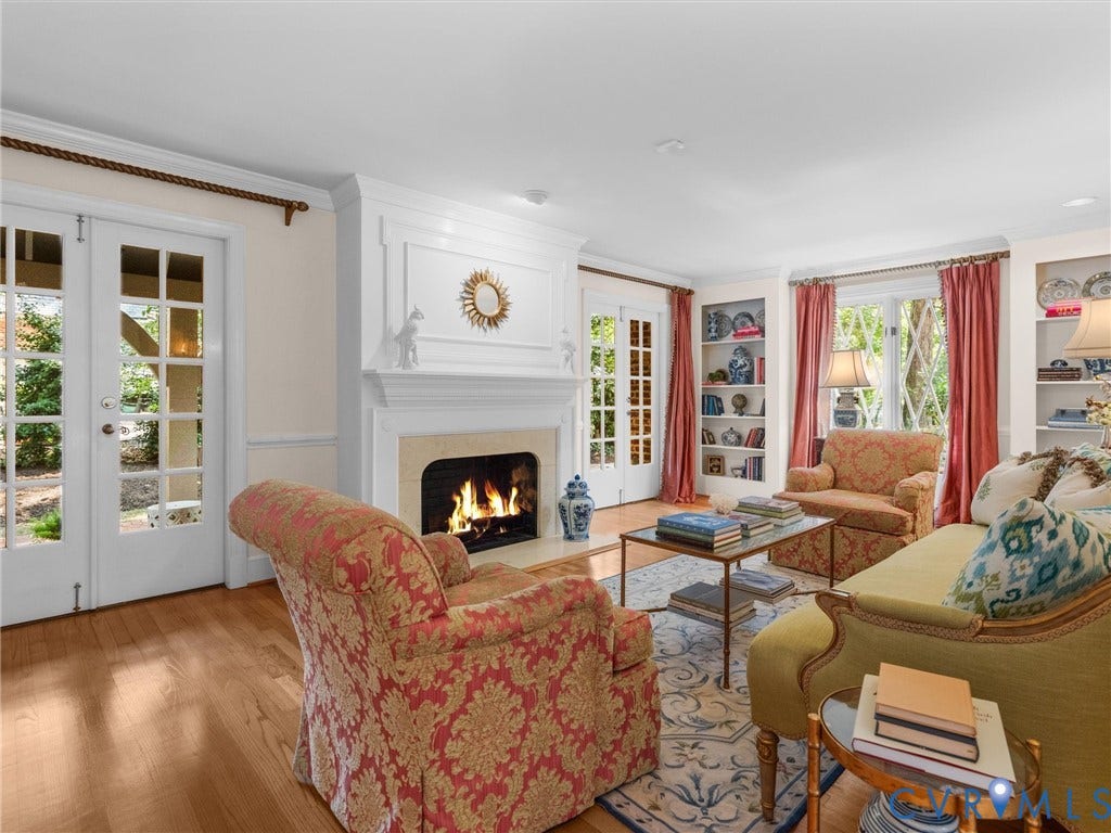 500 Kilmarnock Drive, Collegiate Area, Henrico, VA 23229 Hardwood flooring, a fireplace with a detailed mantel, built-in shelving, and French doors