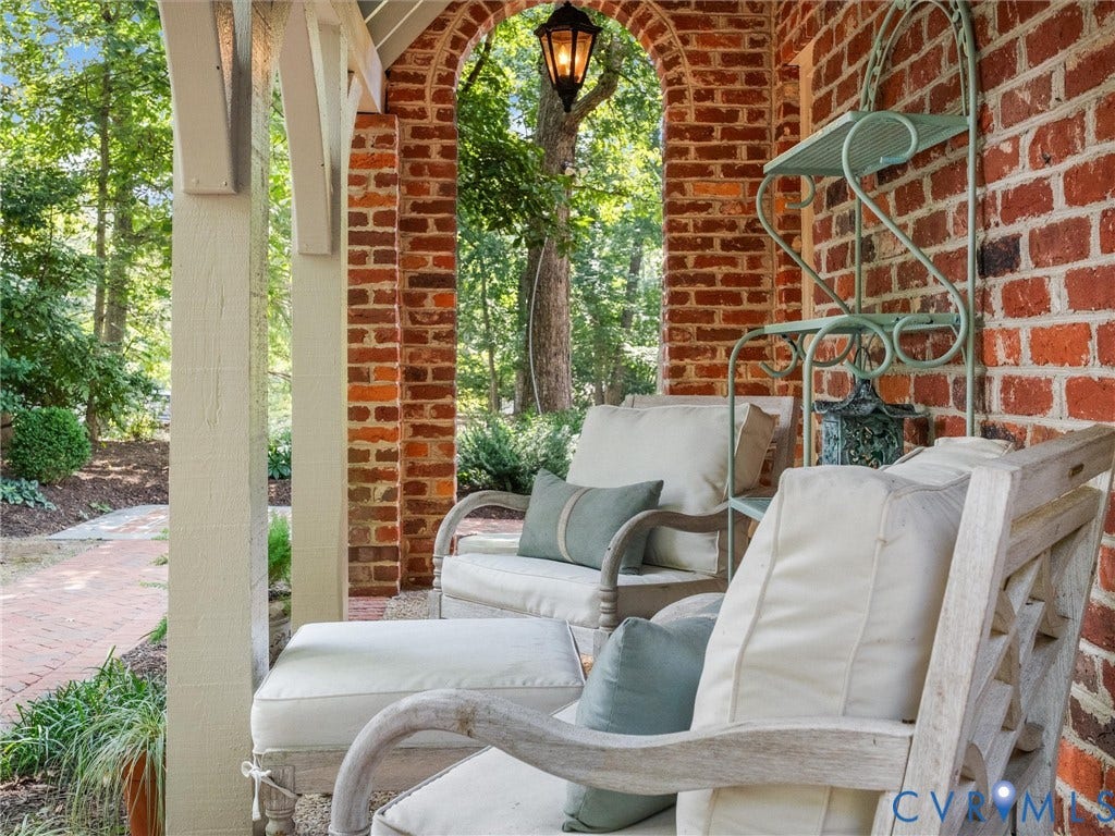 500 Kilmarnock Drive, Collegiate Area, Henrico, VA 23229 Brick archway with an overhead light fixture, providing exterior illumination
