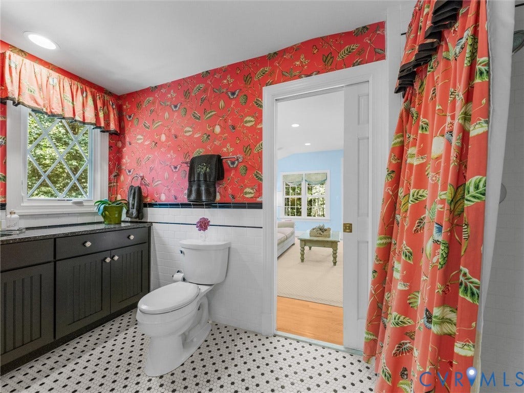 500 Kilmarnock Drive, Collegiate Area, Henrico, VA 23229 Hexagonal tile flooring, black cabinetry with stone countertops, and a window with diamond-patterned muntins