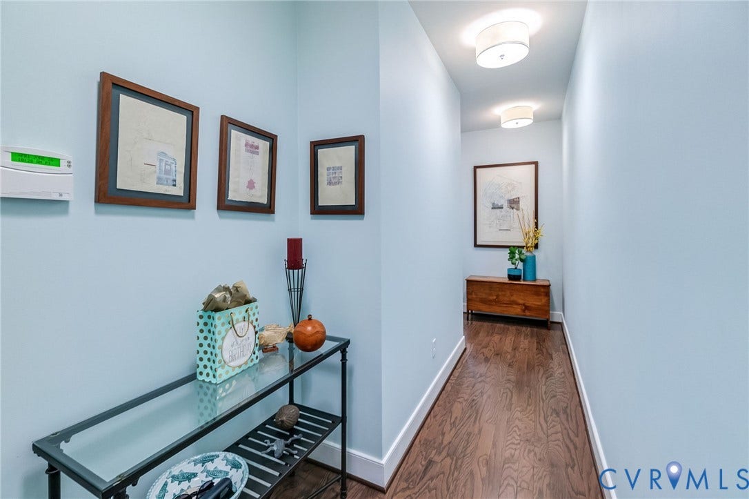 Foyer - with 10+ ft ceilings and wood floors