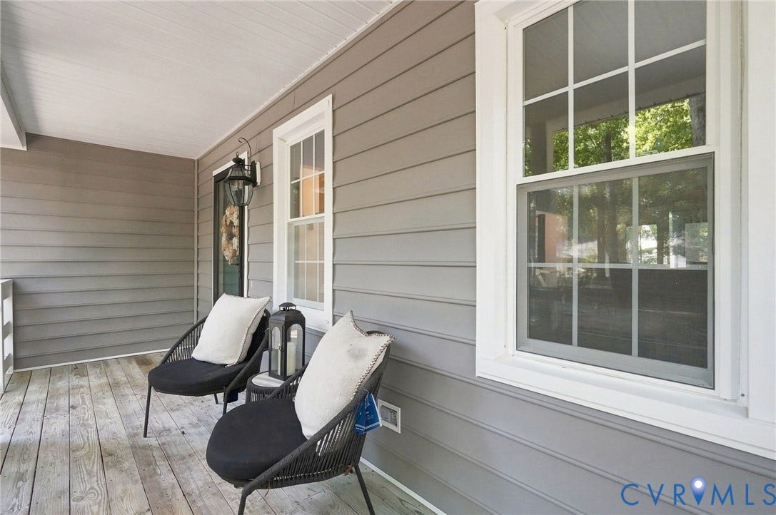 13700 Carriage Creek Place, Chesterfield, VA 23112 Covered porch featuring wood-finish flooring, horizontal siding, and white-framed windows