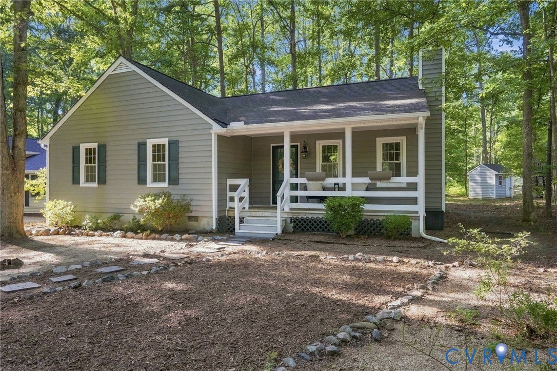 13700 Carriage Creek Place, Chesterfield, VA 23112 Siding exterior with a covered front porch, white railings, and a prominent chimney