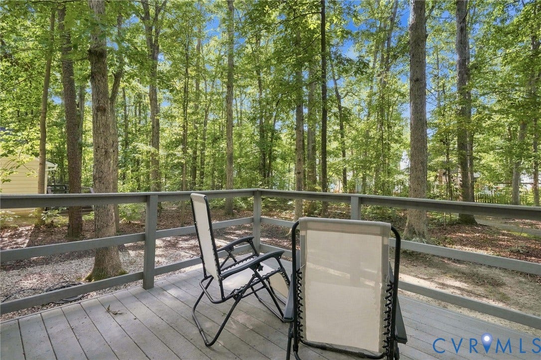 13700 Carriage Creek Place, Chesterfield, VA 23112 Expansive deck featuring wood-finish decking and a sturdy wood railing