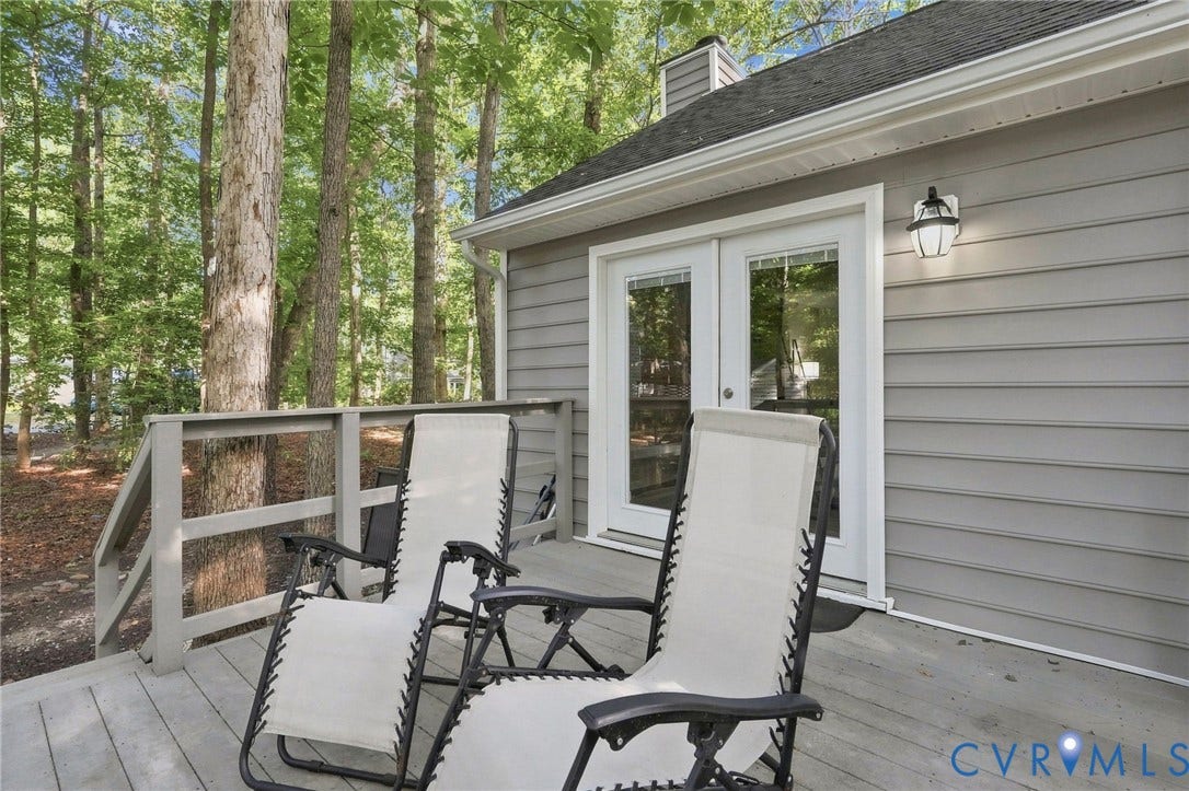 13700 Carriage Creek Place, Chesterfield, VA 23112 Exterior deck with gray wood-finish decking and railing
