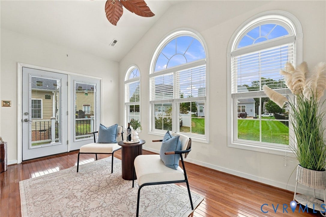 9619 Redwick Drive, Matoaca, Chesterfield, VA 23112 Vaulted ceiling, hardwood flooring, arched windows, double French doors, and a ceiling fan