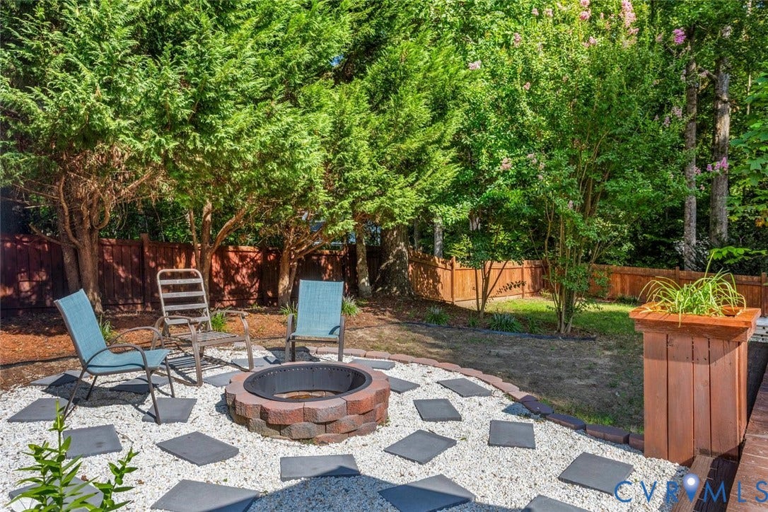 13911 Deer Thicket Lane, Midlothian, VA 23112 Great space to enjoy the change in seasons with a built-in firepit