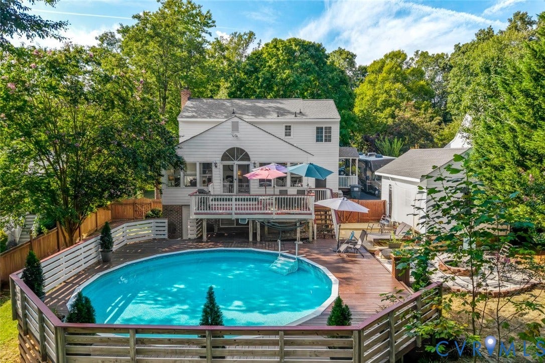 13911 Deer Thicket Lane, Midlothian, VA 23112 A backyard retreat! Multiple entertaining areas and privacy.