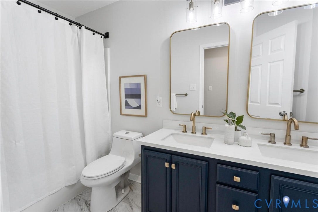 tub shower, painted vanity, new floor, fixtures
