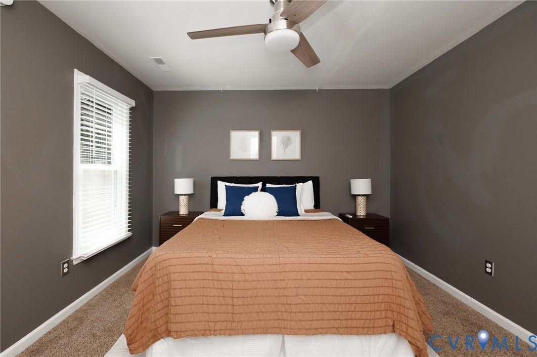 20520 Cox Road, Sutherland, VA 23885 Plush carpeting, neutral wall tones, and a ceiling fan with integrated lighting