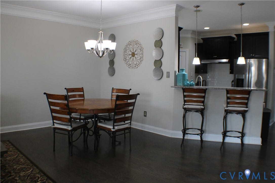 7016 Hawser Lane, Watermark, North Chesterfield, VA 23234 Expansive, & stunning great room w/ hardwood floors, 9, ceilings, crown molding! Open to the chef kitchen and dining area!
