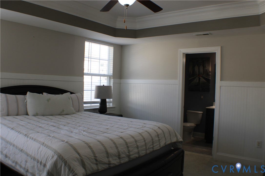 7016 Hawser Lane, Watermark, North Chesterfield, VA 23234 Light, bright, large! Beautifully detailed FIRST FLOOR PRIMARY BEDROOM w/ tray ceiling with crown, wainscoting, primary bath & walk in closet w/ organizers!
