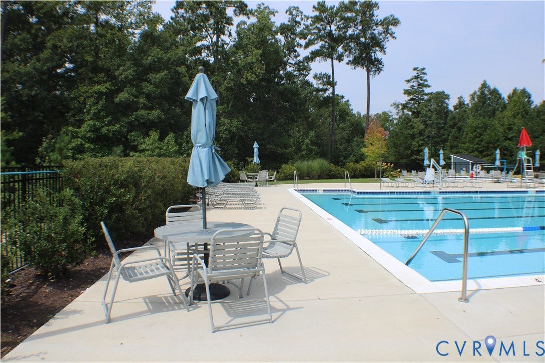 7016 Hawser Lane, Watermark, North Chesterfield, VA 23234 Expansive outdoor swimming pool with multiple lanes and many seating areas!