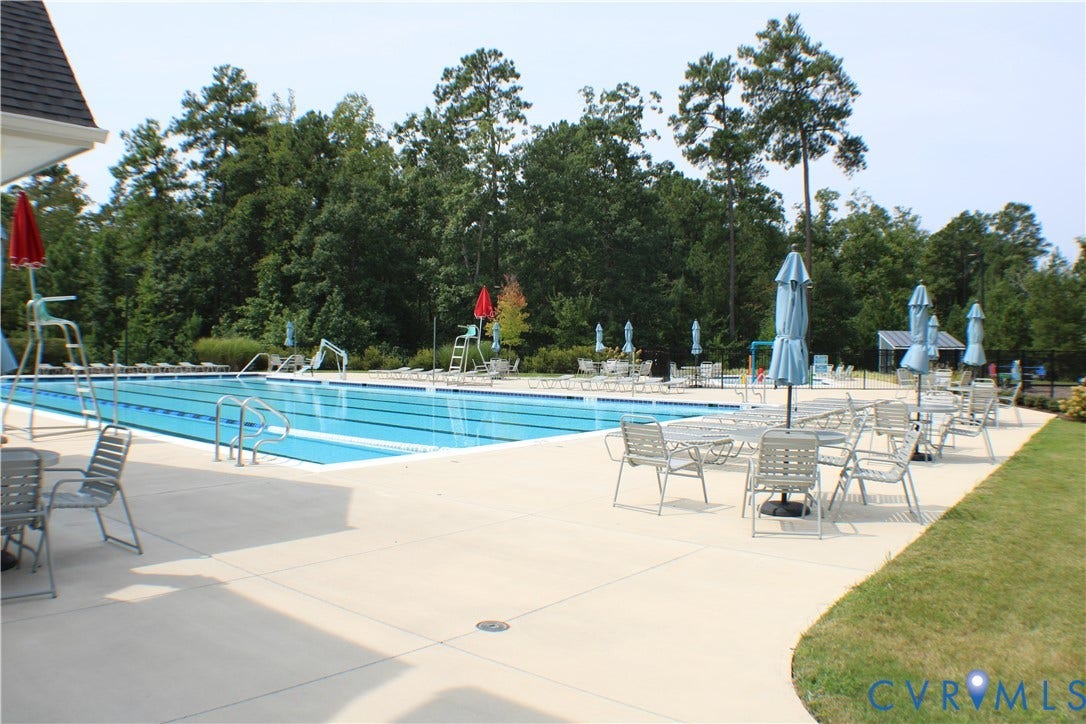 7016 Hawser Lane, Watermark, North Chesterfield, VA 23234 Expansive outdoor swimming pool with multiple lanes and many seating areas!