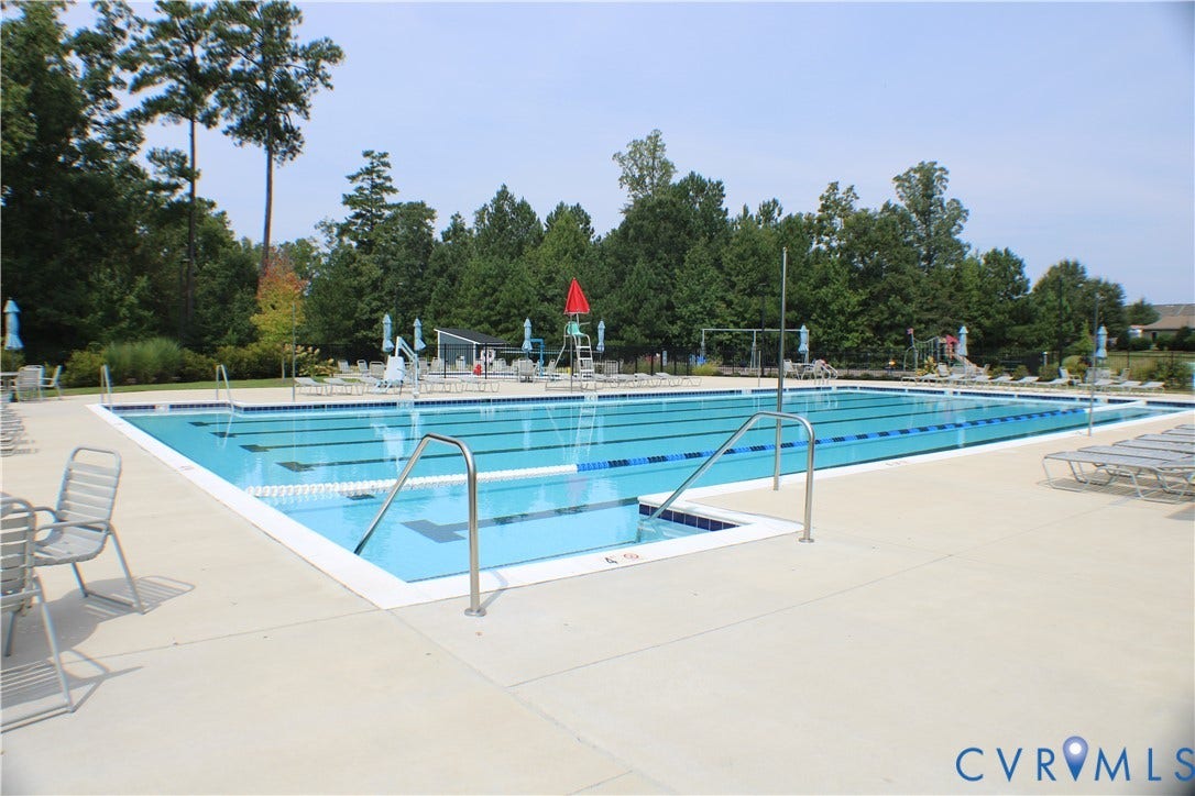 7016 Hawser Lane, Watermark, North Chesterfield, VA 23234 Expansive outdoor swimming pool with multiple lanes and many seating areas!