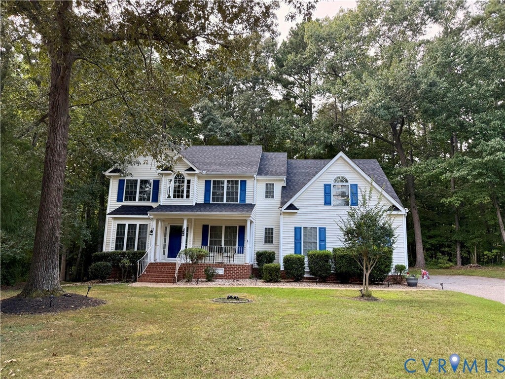 5221 Lippingham Court, Chesterfield, VA 23831 Traditional two-story residence with white siding, blue shutters, and a dark shingle roof